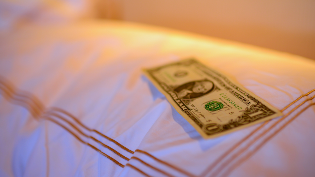 money on a pillow budgeting for tips in Las Vegas